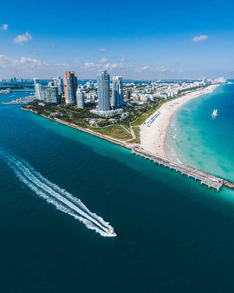 Aerial view of ocean and speedboat